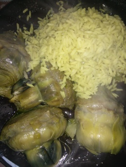 Artichokes boiled in water and apple cider vinegar with some black pepper and boiled basmati rice