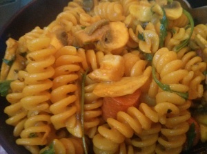 pasta "primavera", mushrooms, carrots, turmeric, tomatoes and rocket salad